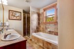 This bathroom provides added privacy for this guest suite